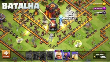 Captura de ecrã de Clash of Clans com a aldeia e tropas